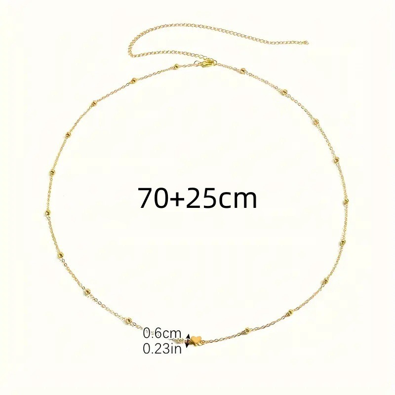 Sierlijke gouden hartvormige t - Body Jewellery recensie en prijs
